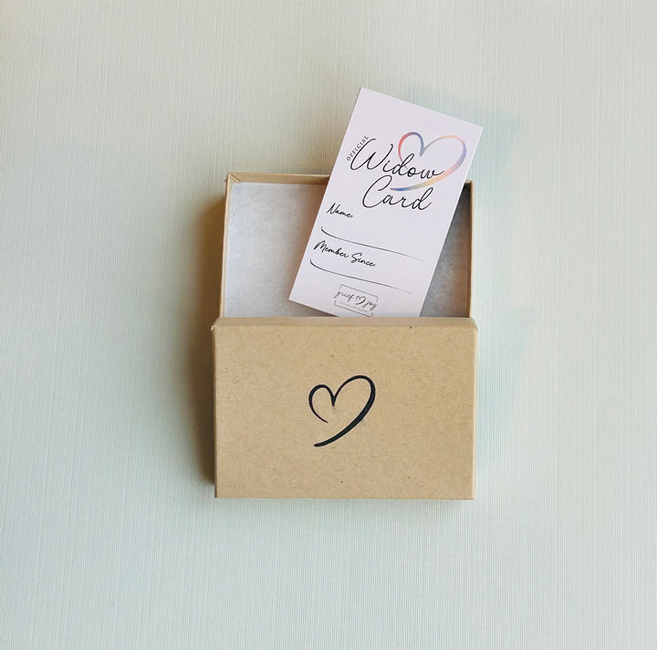 Grief & Joy Official Widow Card coming out of gift box