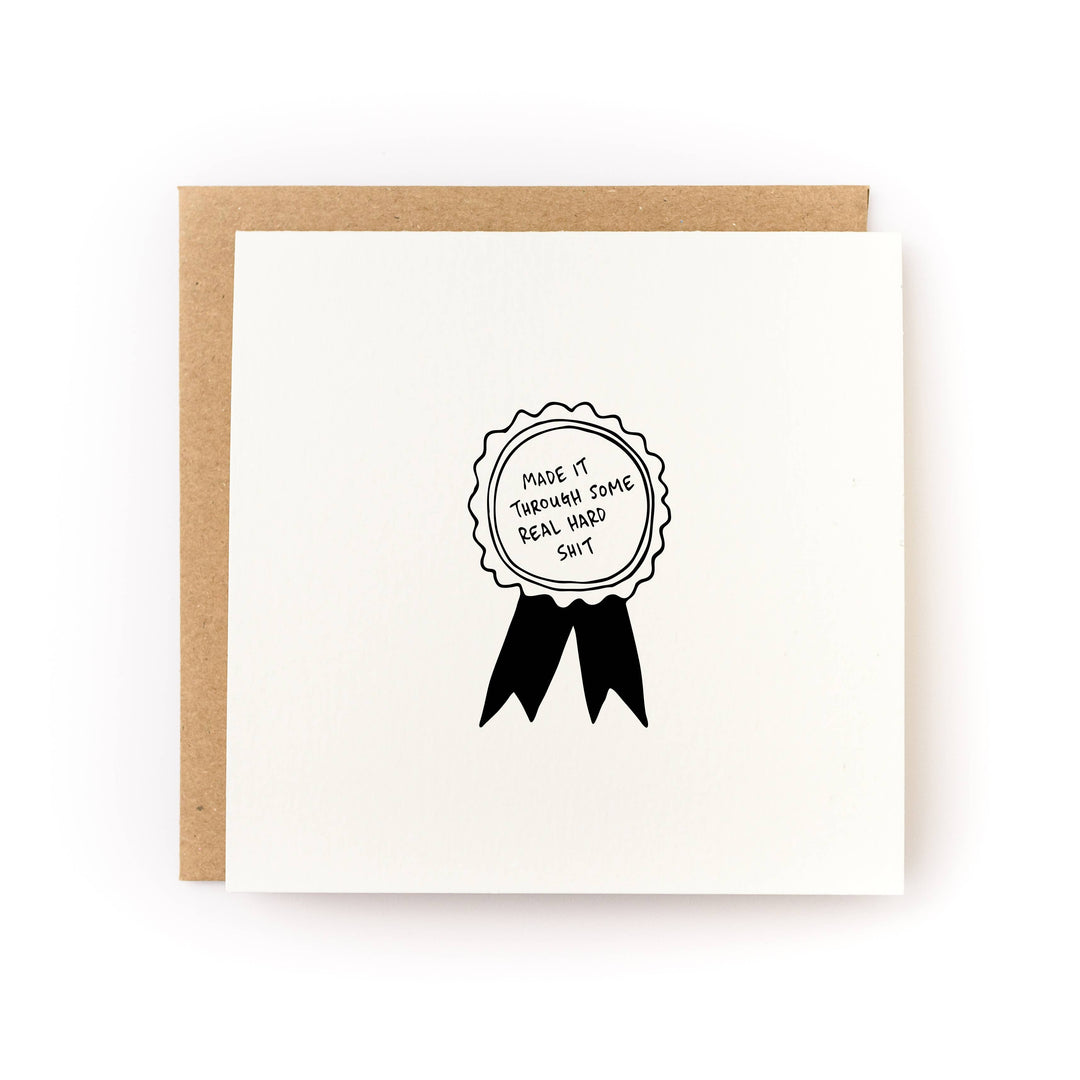 Made It Through Some Real Hard Shit Medal Sympathy Card front view
Honest sympathy card honoring resilience and strength
Blank inside sympathy greeting card with kraft envelope