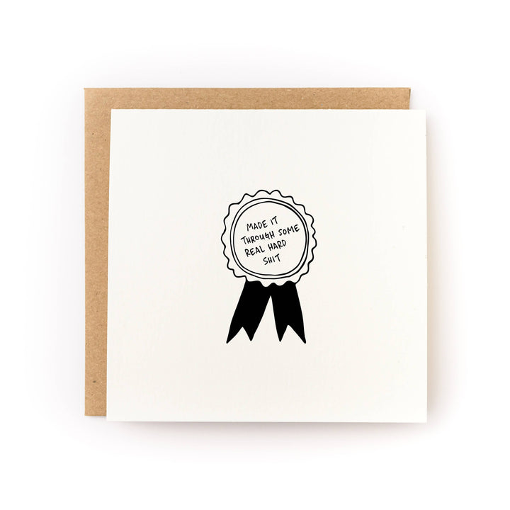 Made It Through Some Real Hard Shit Medal Sympathy Card front view
Honest sympathy card honoring resilience and strength
Blank inside sympathy greeting card with kraft envelope