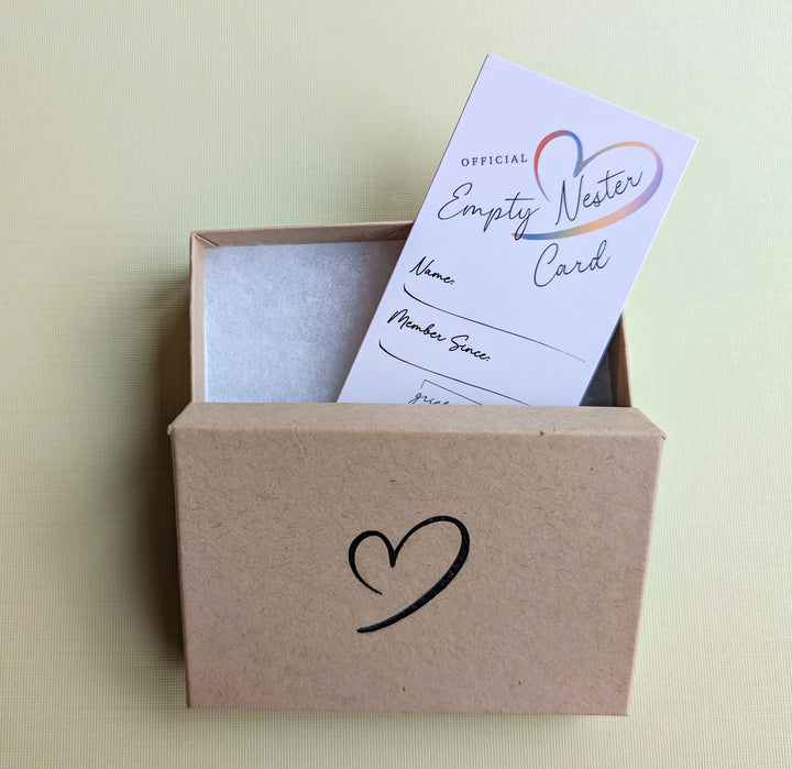 Official Empty Nester Card coming out of box